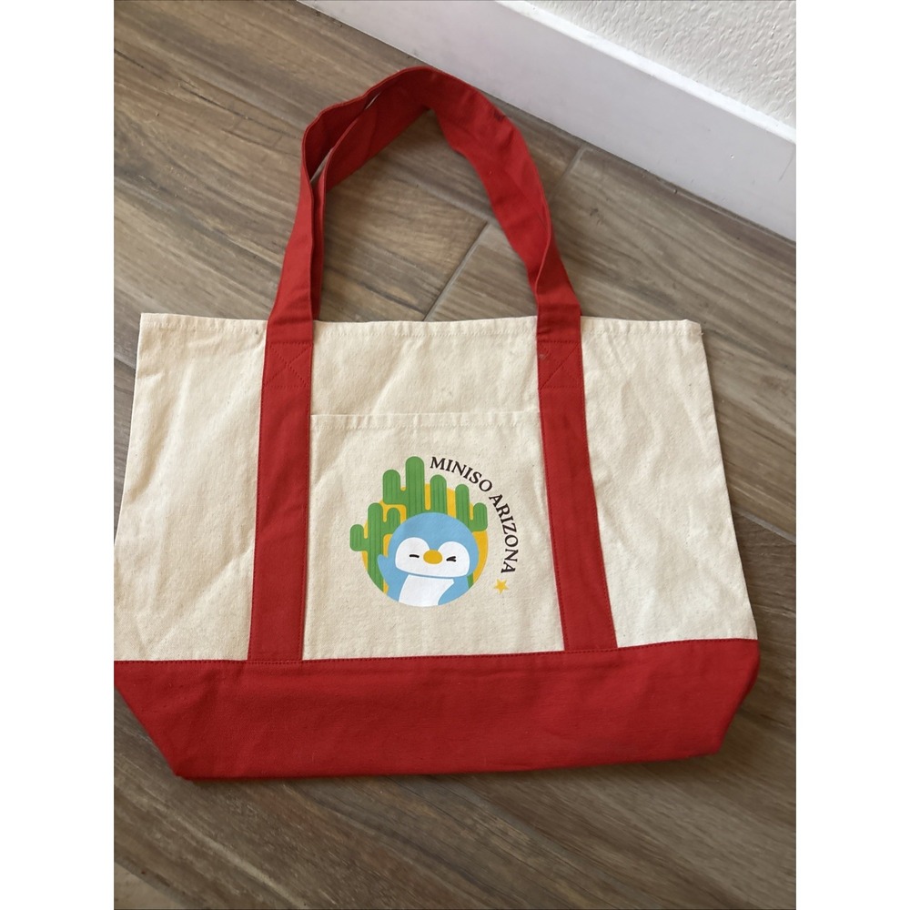 MINISO Arizona Collectible Tote Bag Cream Red Penguin Graphic Medium Handbag